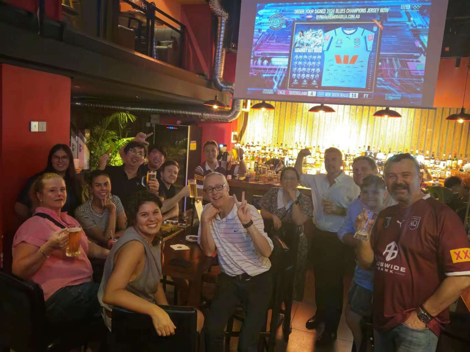 Expat community event at Butchers Block Bar & Grill in Guangzhou, featuring guests enjoying drinks and socializing.